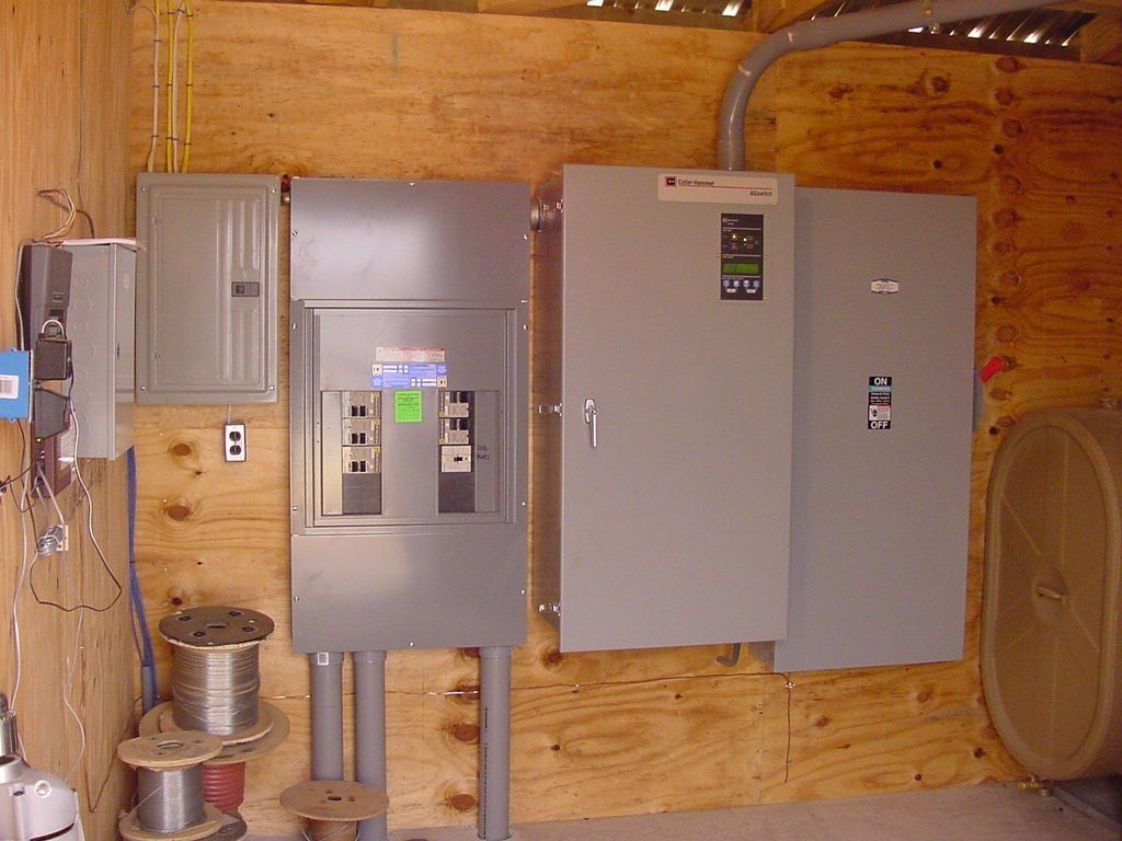 ourdoor lighting — Men Working on Underground Electric for Generator in Rhodesdale, MD