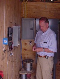 Electrical — Man Working on Electric Circuit in Rhodesdale, MD Electrical — Man Working on Electric Circuit in Rhodesdale, MD