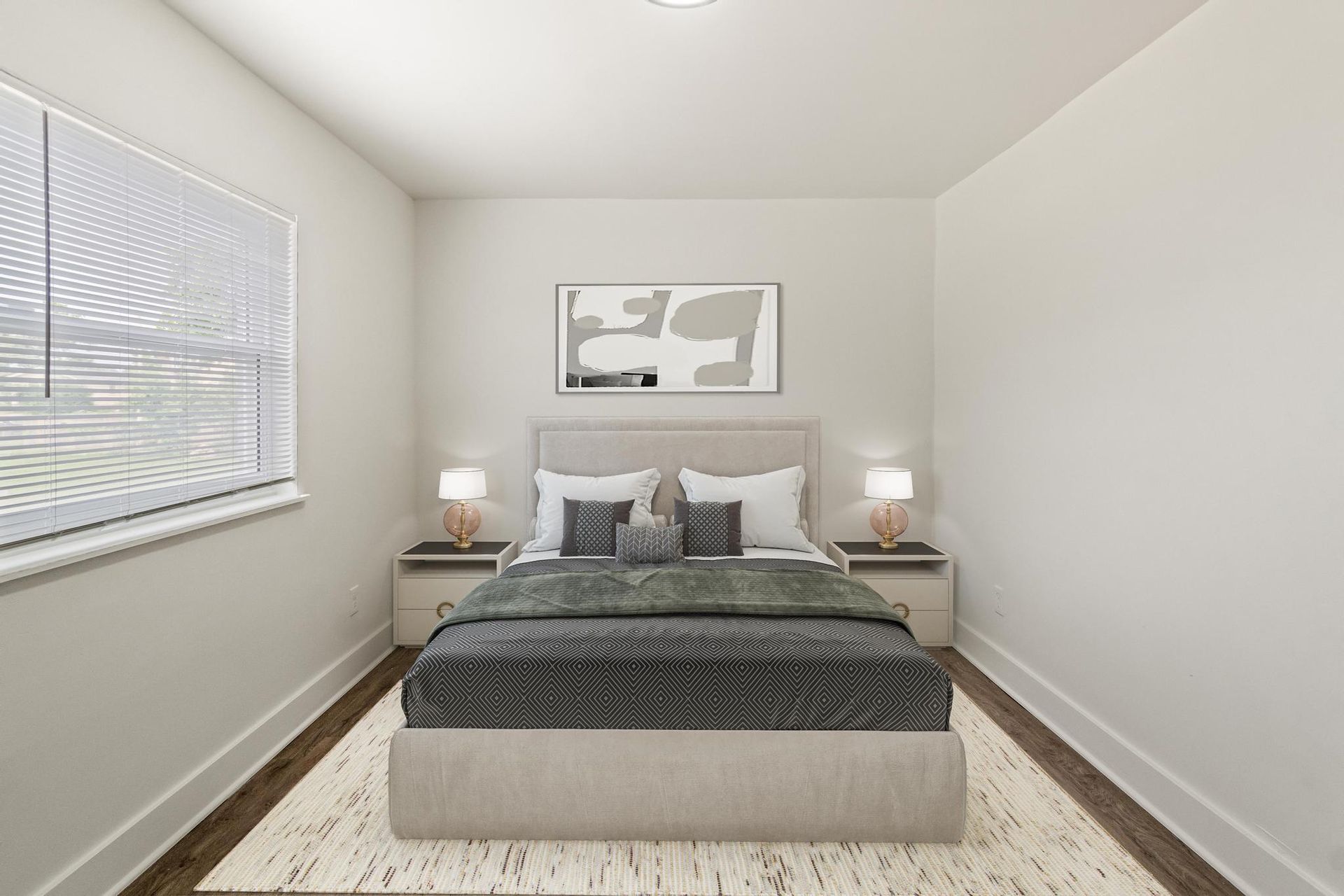A bedroom with a bed , nightstands , lamps and a window.