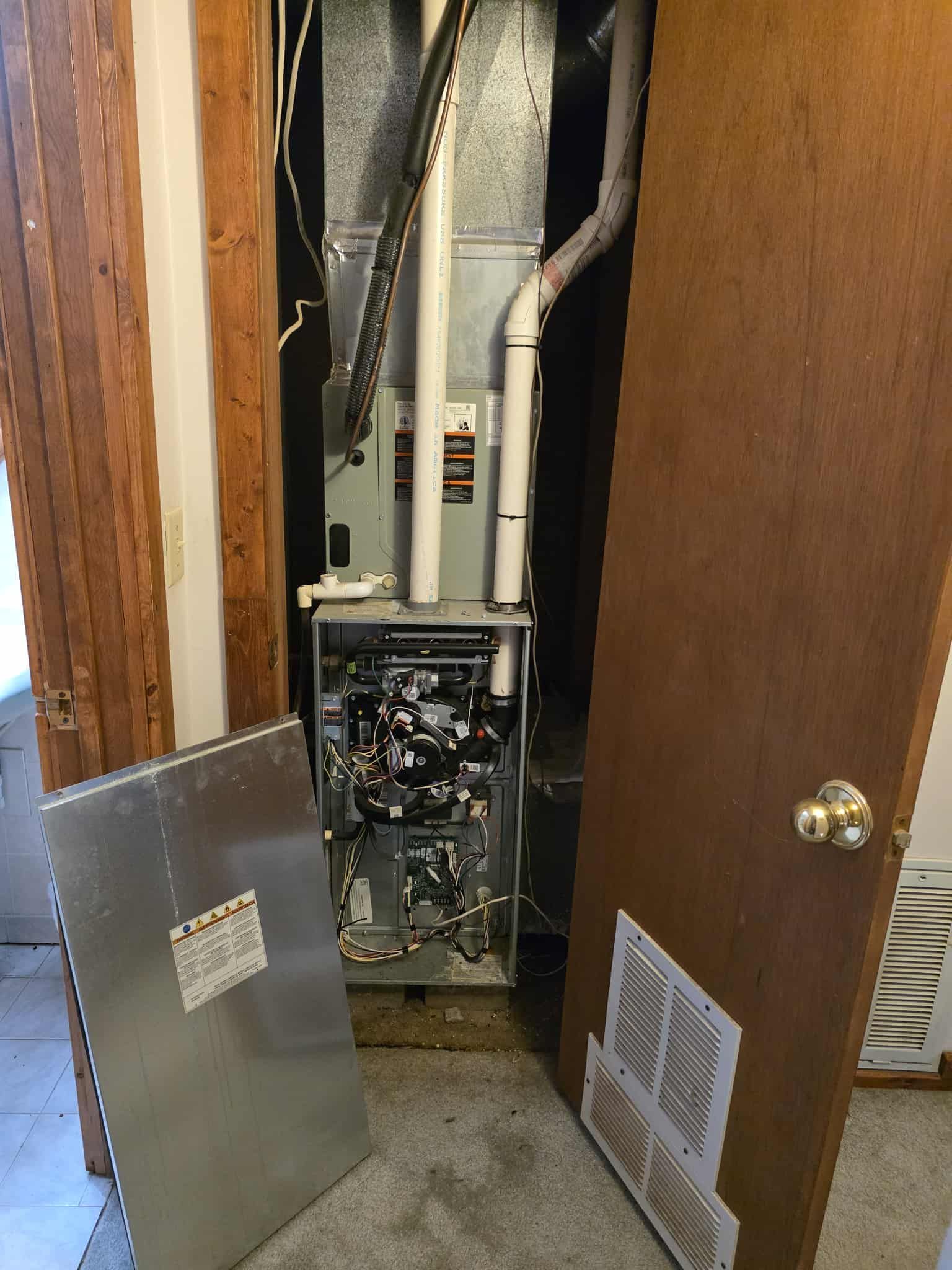 A wooden fence with a gate attached to it.