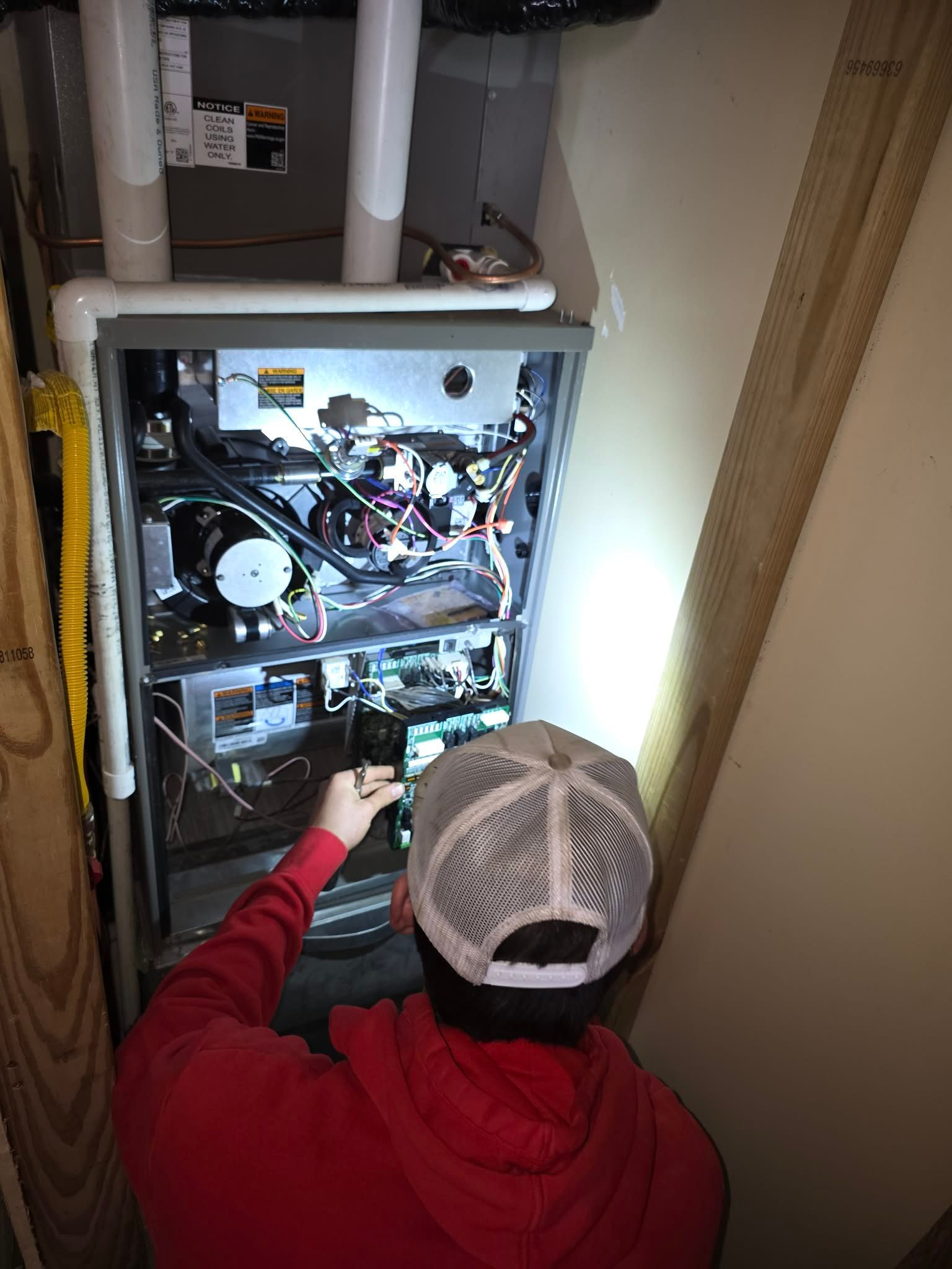 A wooden fence with a gate attached to it.