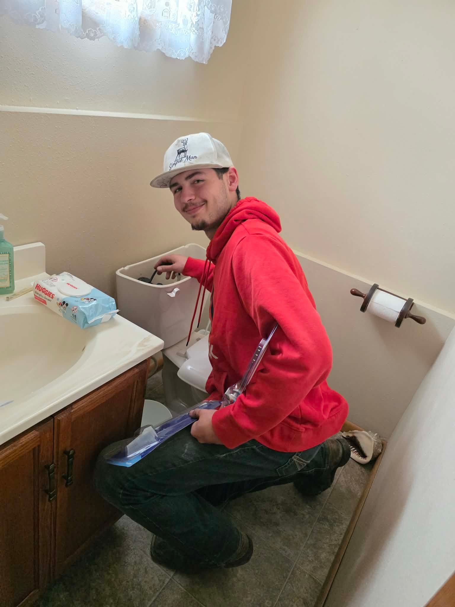 A wooden fence with a gate attached to it.