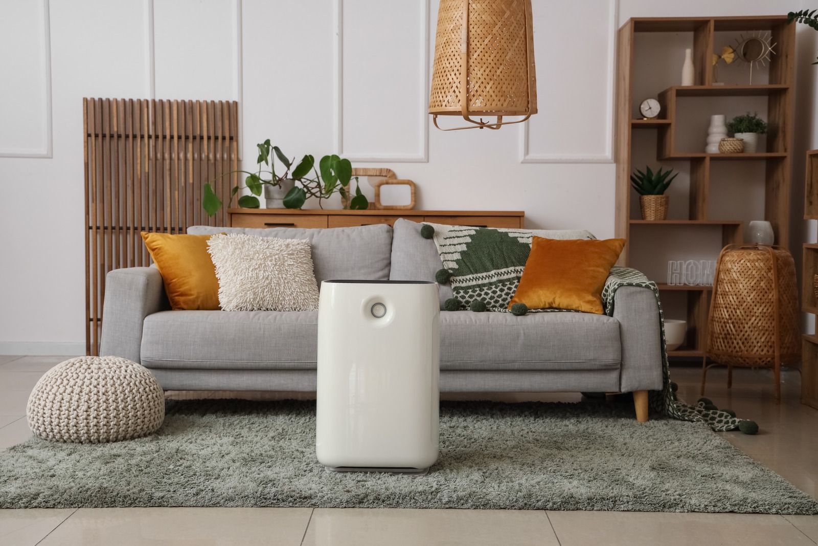 A wooden fence is sitting on top of a lush green field.