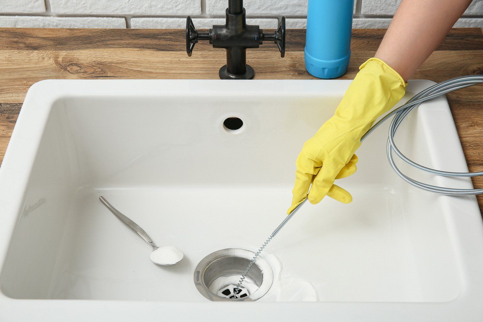 A wooden fence with a gate attached to it.