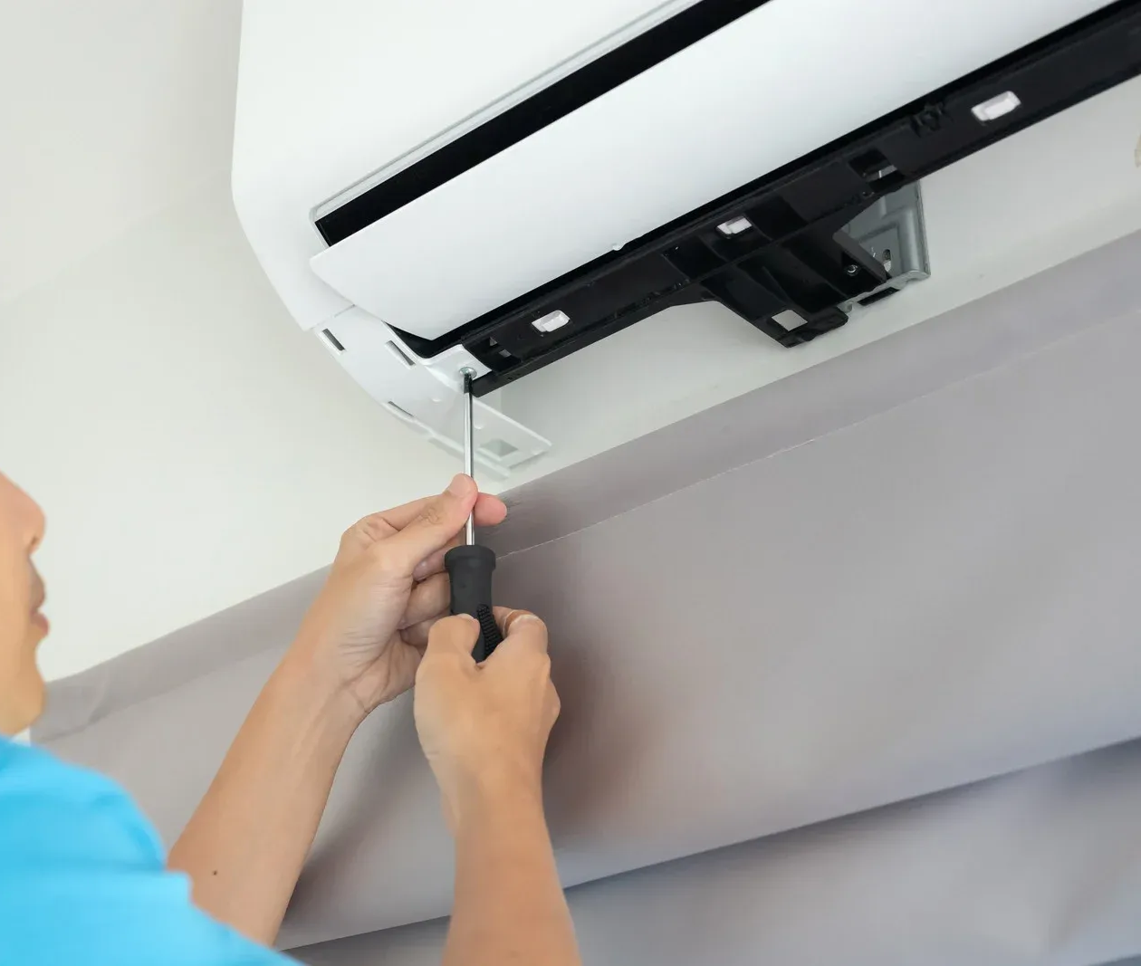 A wooden fence with a gate attached to it.