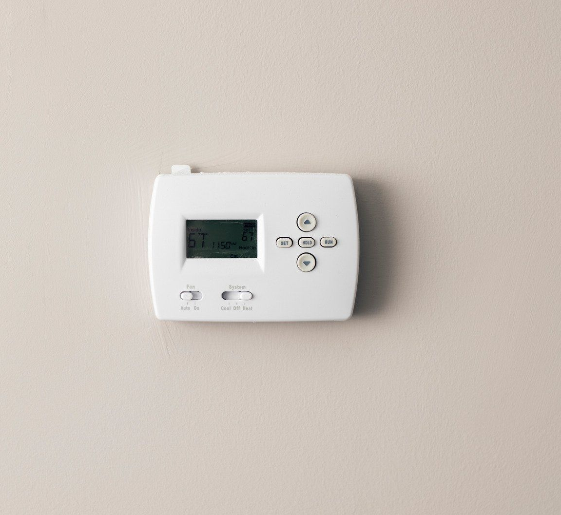 A wooden fence with a gate attached to it.