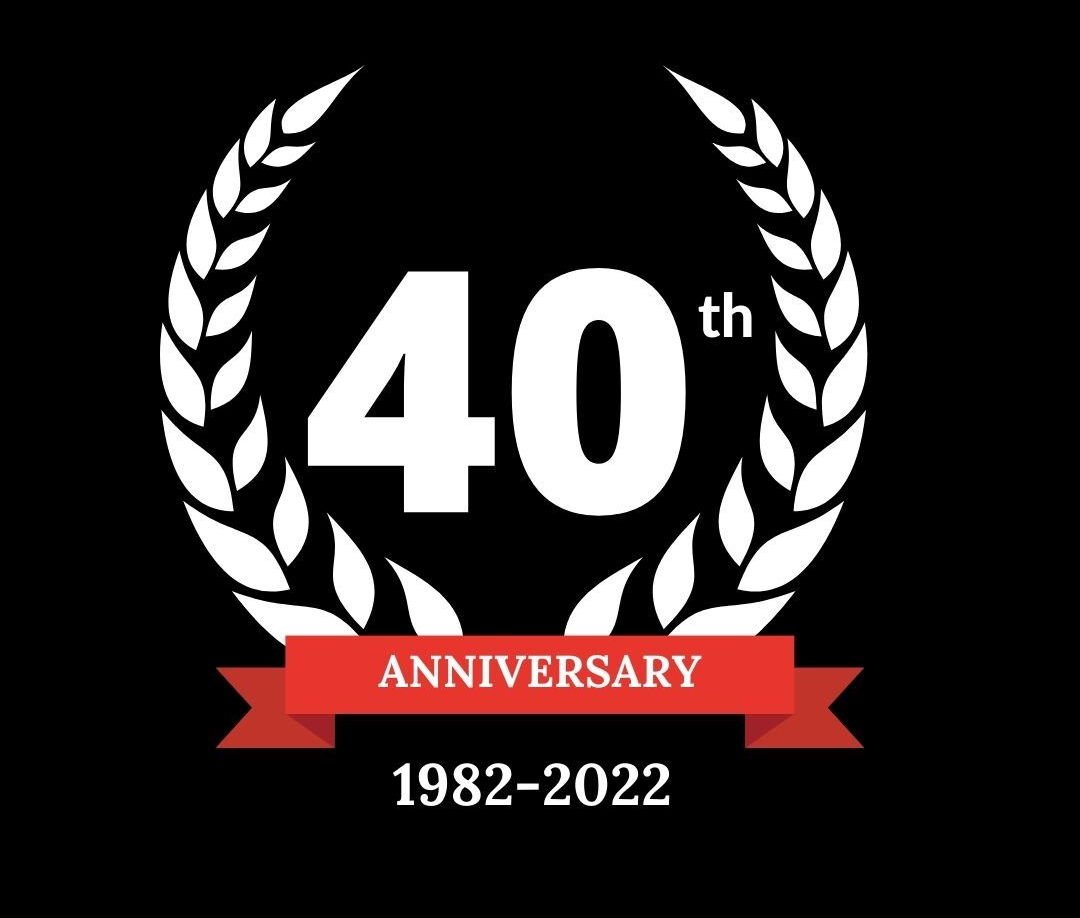 A 40th anniversary logo with a laurel wreath and a red ribbon.