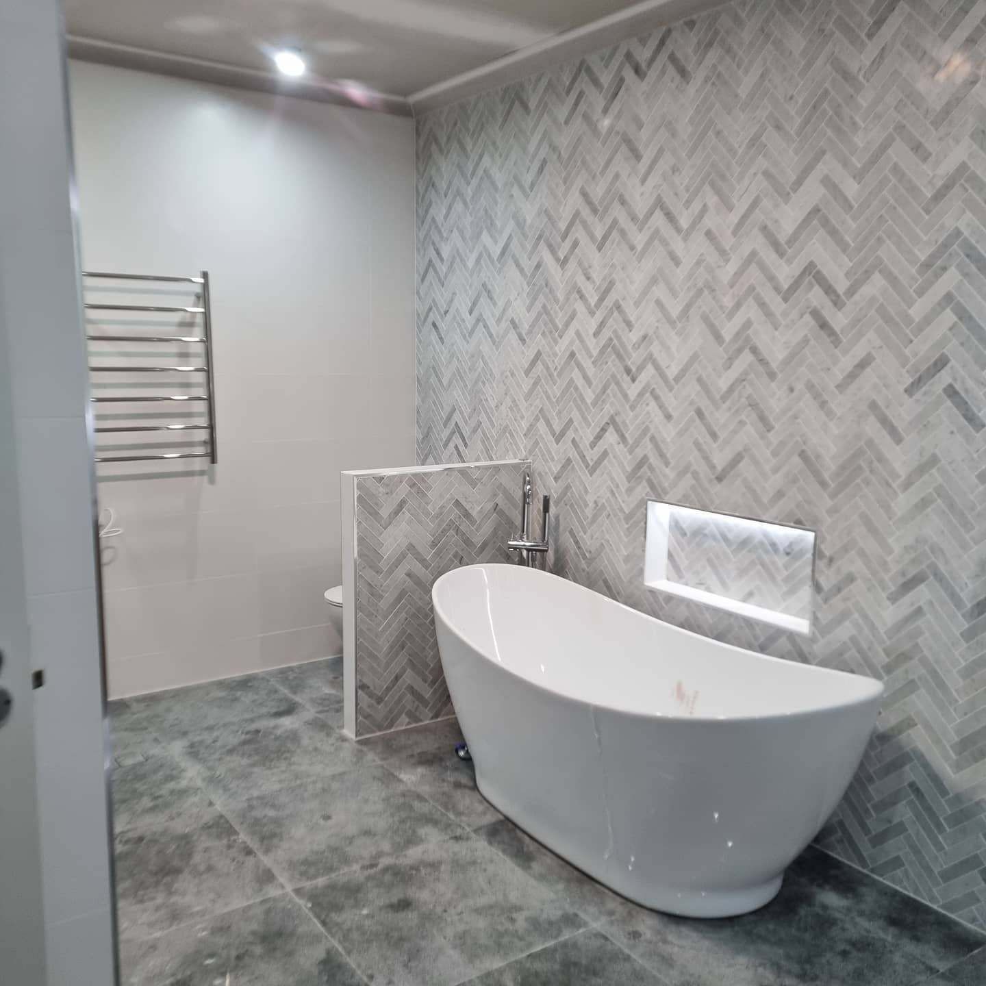 A Bathroom with A Bathtub and A Toilet — Goldspark GC Electrical in Burleigh Waters, QLD
