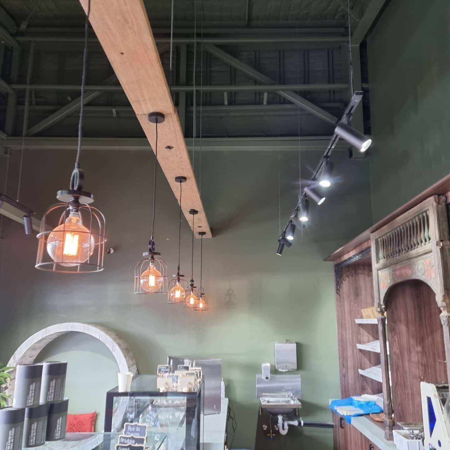 A Restaurant with A Wooden Beam Hanging from The Ceiling — Goldspark GC Electrical in Burleigh Waters, QLD