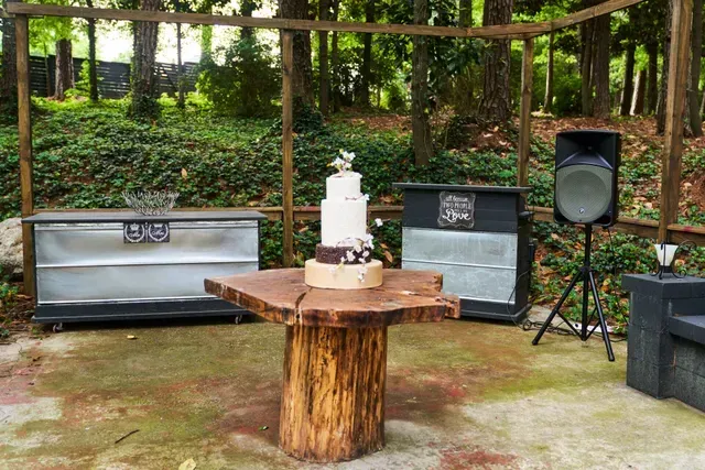Wedding Cake at the Top of Wooden Table — Atlanta, GA — Pristine Chapel