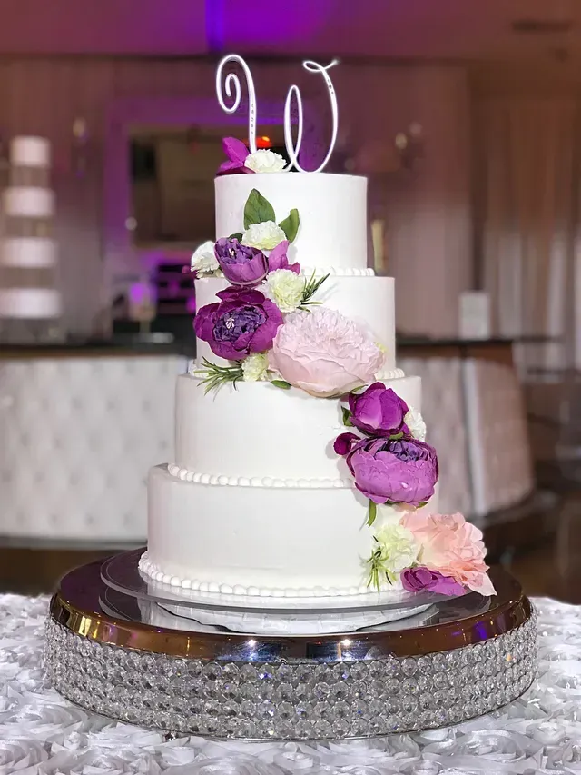 Wedding Cake with Violet Flowers — Atlanta, GA — Pristine Chapel
