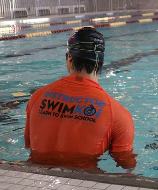 Person in orange shirt with 