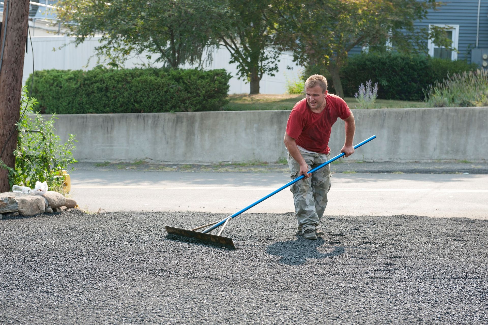 Man Working On Driveway - Marlborough, MA - JT Paving & Sealcoating