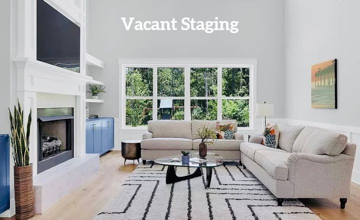 A living room with a couch and a fireplace and the words vacant staging above it