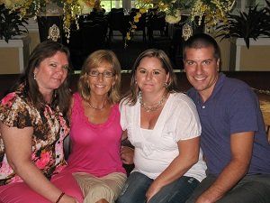 A group of people are posing for a picture together