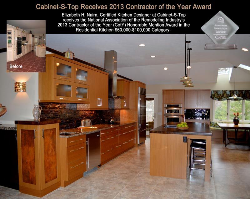 A picture of a kitchen with the words cabinet-s-top receives 2013 contractor of the year award