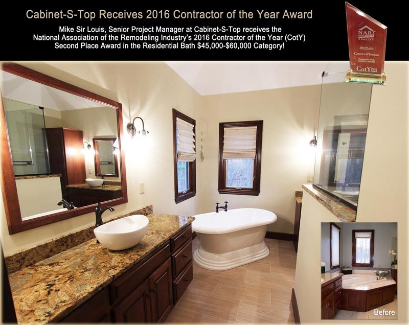 A bathroom with two sinks , a tub and a mirror.