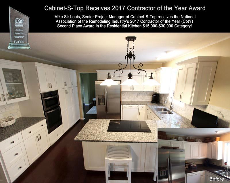 A kitchen with white cabinets and granite counter tops has been awarded a contractor of the year award.