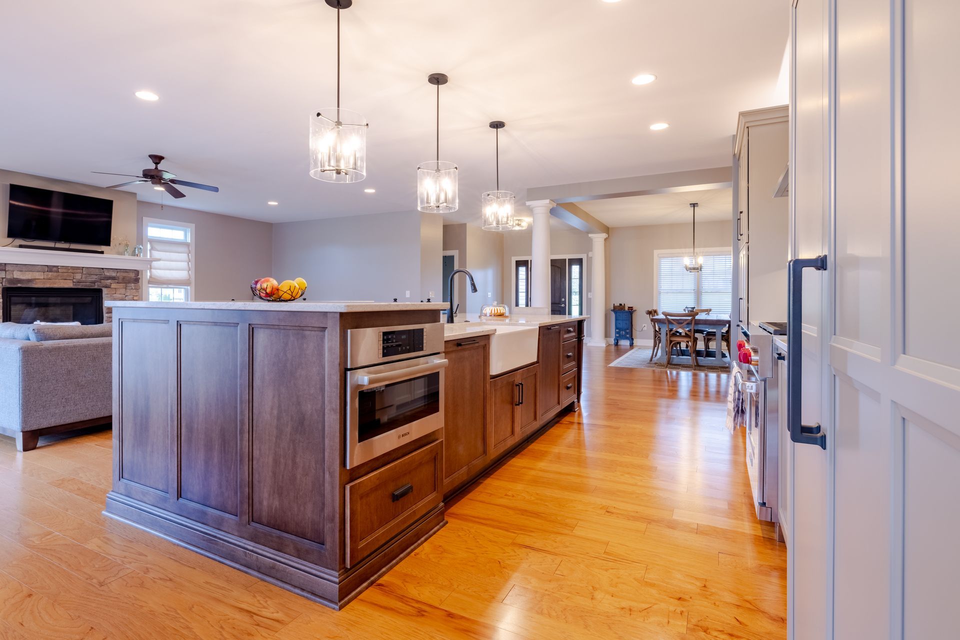 There is a large island in the middle of the kitchen.