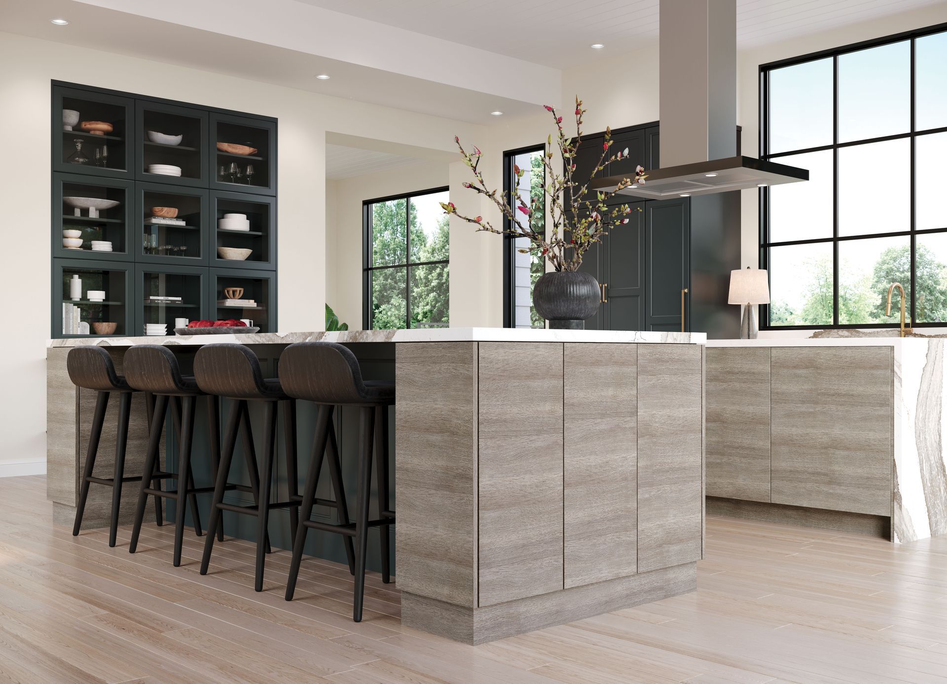 A kitchen with a large island , stools and a hood.