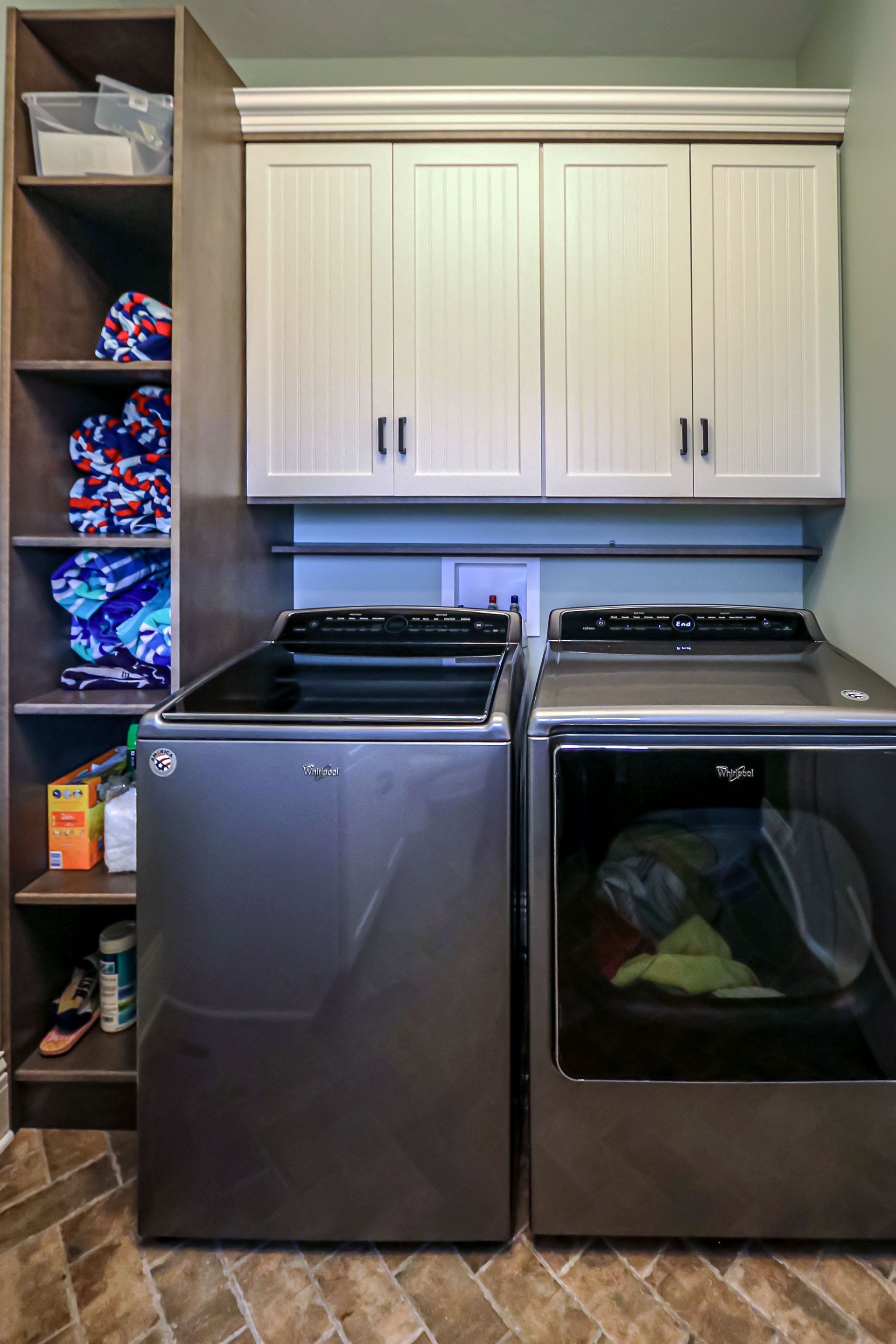 There is a washer and dryer in the laundry room.