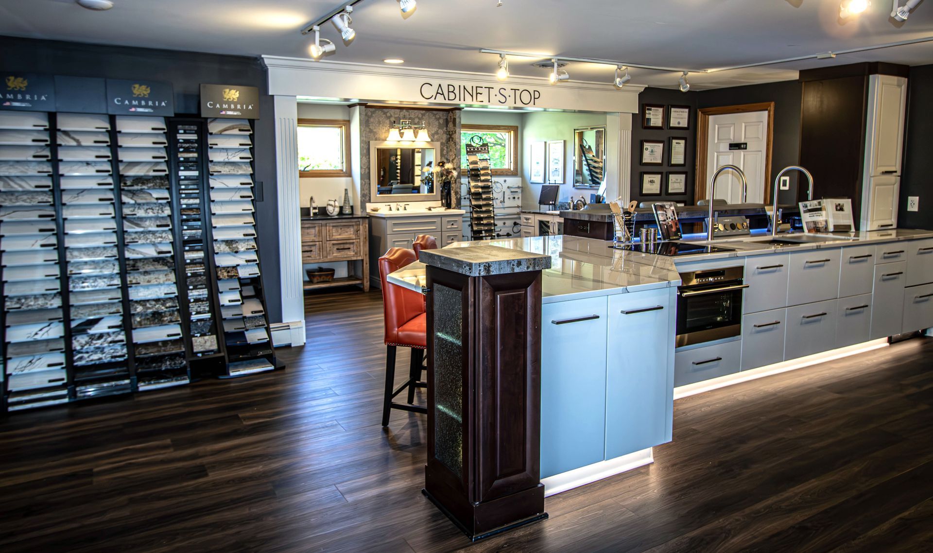 A kitchen with a large island in the middle of the room.