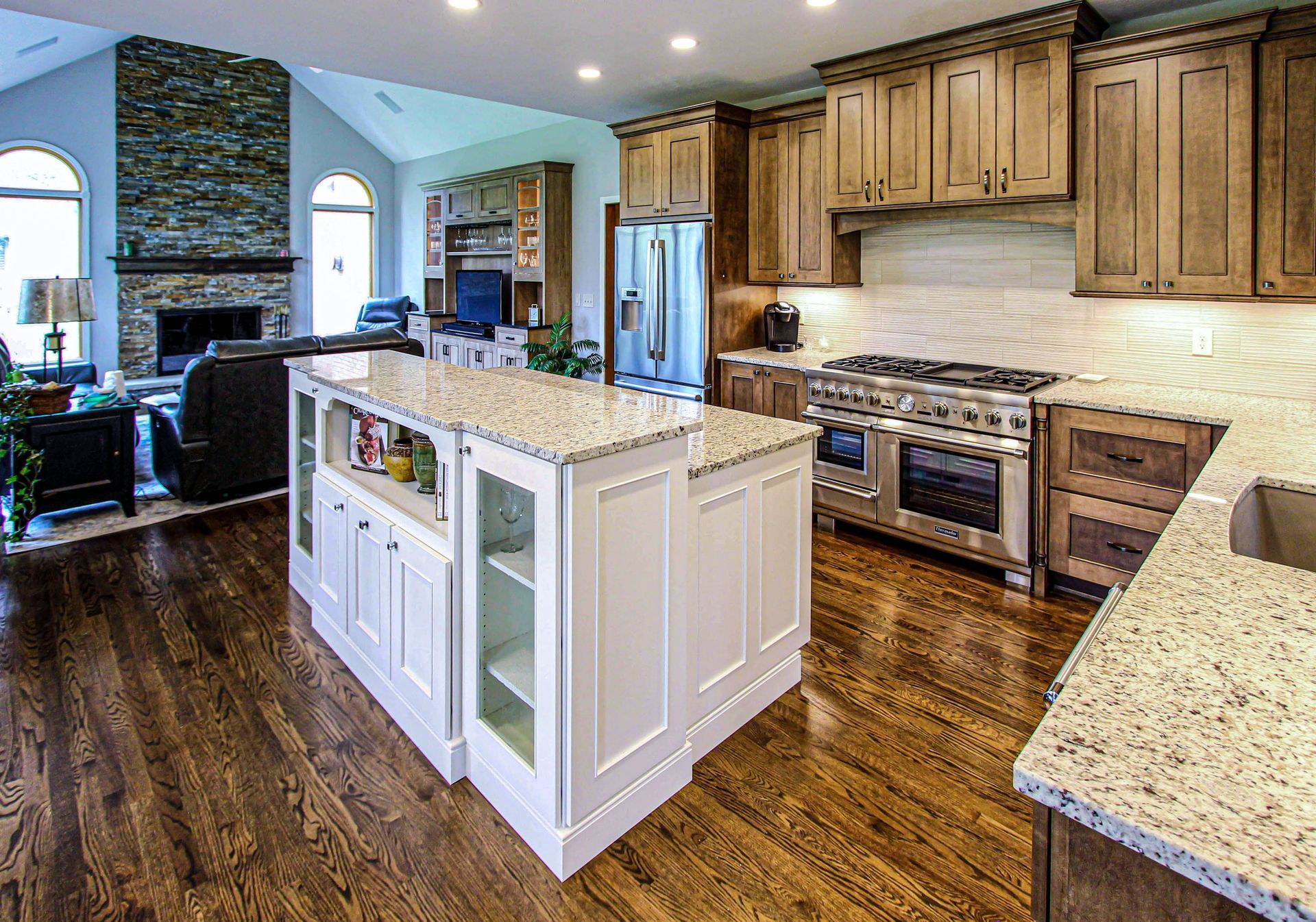 A kitchen with a large island in the middle of it