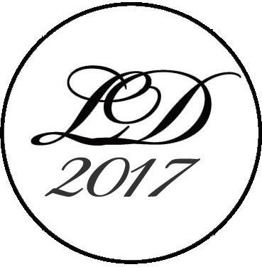 A black and white logo for ld 2017 in a circle on a white background.