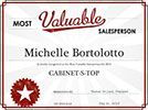 A certificate that says `` most valuable salesperson michelle bortolotto cabinets top ''.
