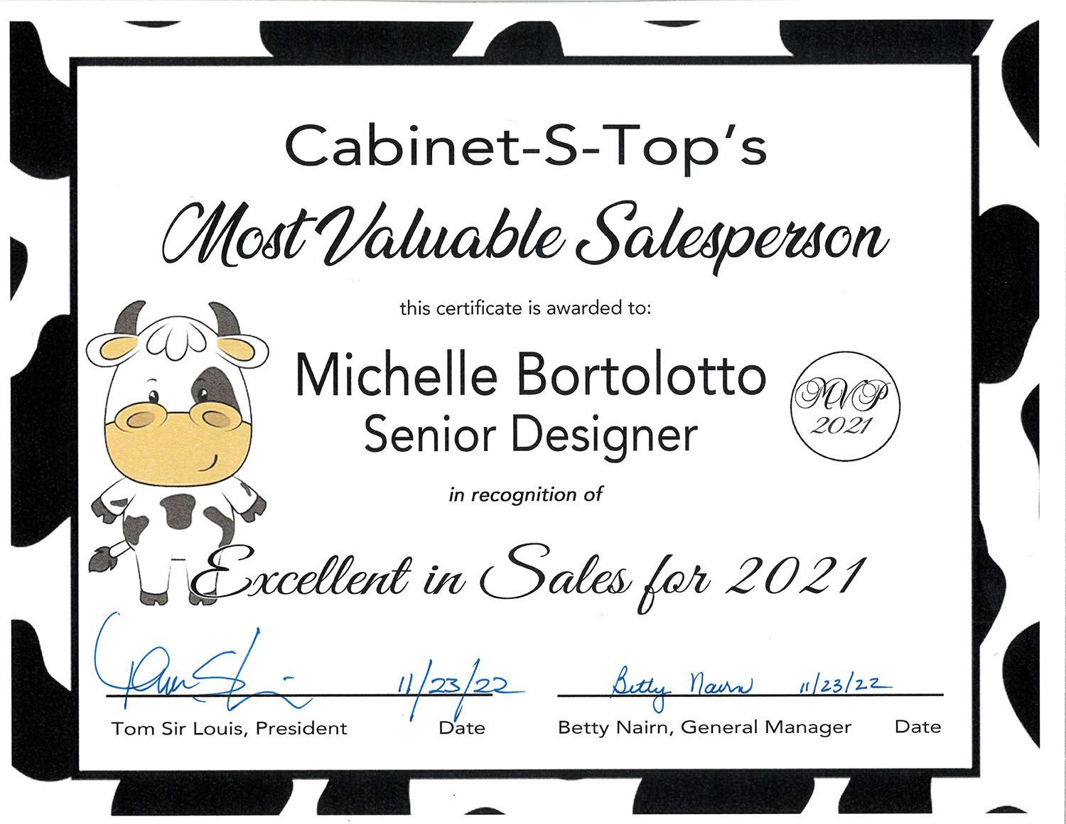 A certificate that says `` cabinet-s-top 's most valuable salesperson michelle bortolotto senior designer excellent in sales for 2021 ''