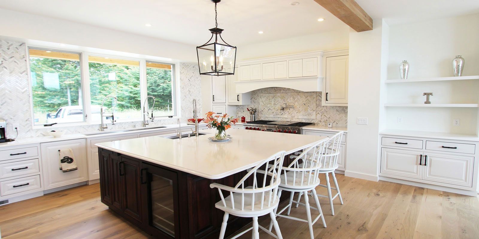 There is a large island in the middle of the kitchen.
