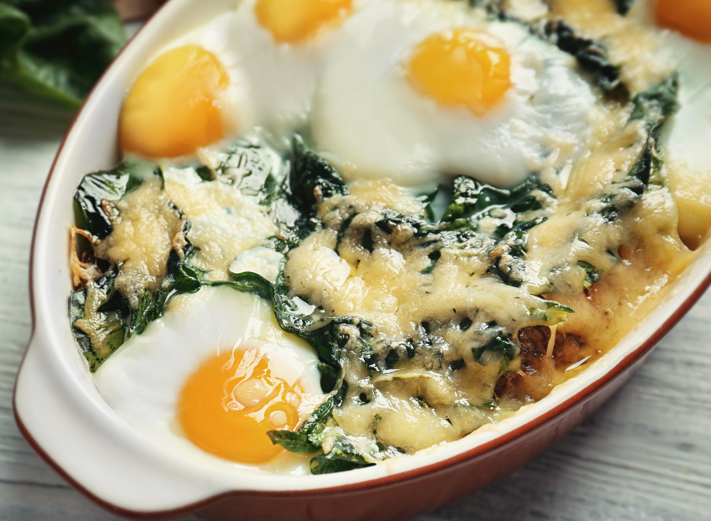 a pink cake with a bunny on top of it is on a table at a birthday party .