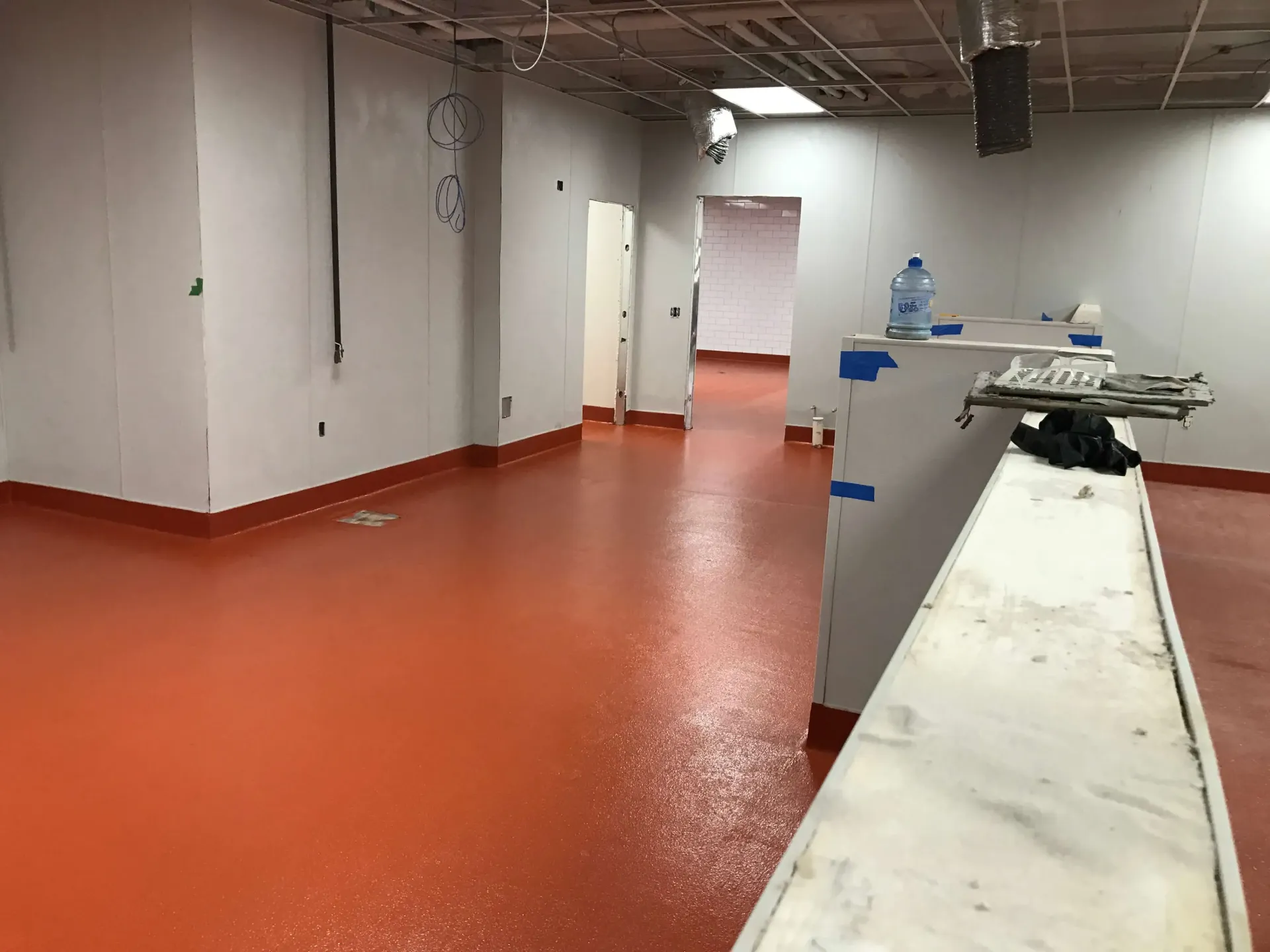 There is a conveyor belt in the middle of the room.