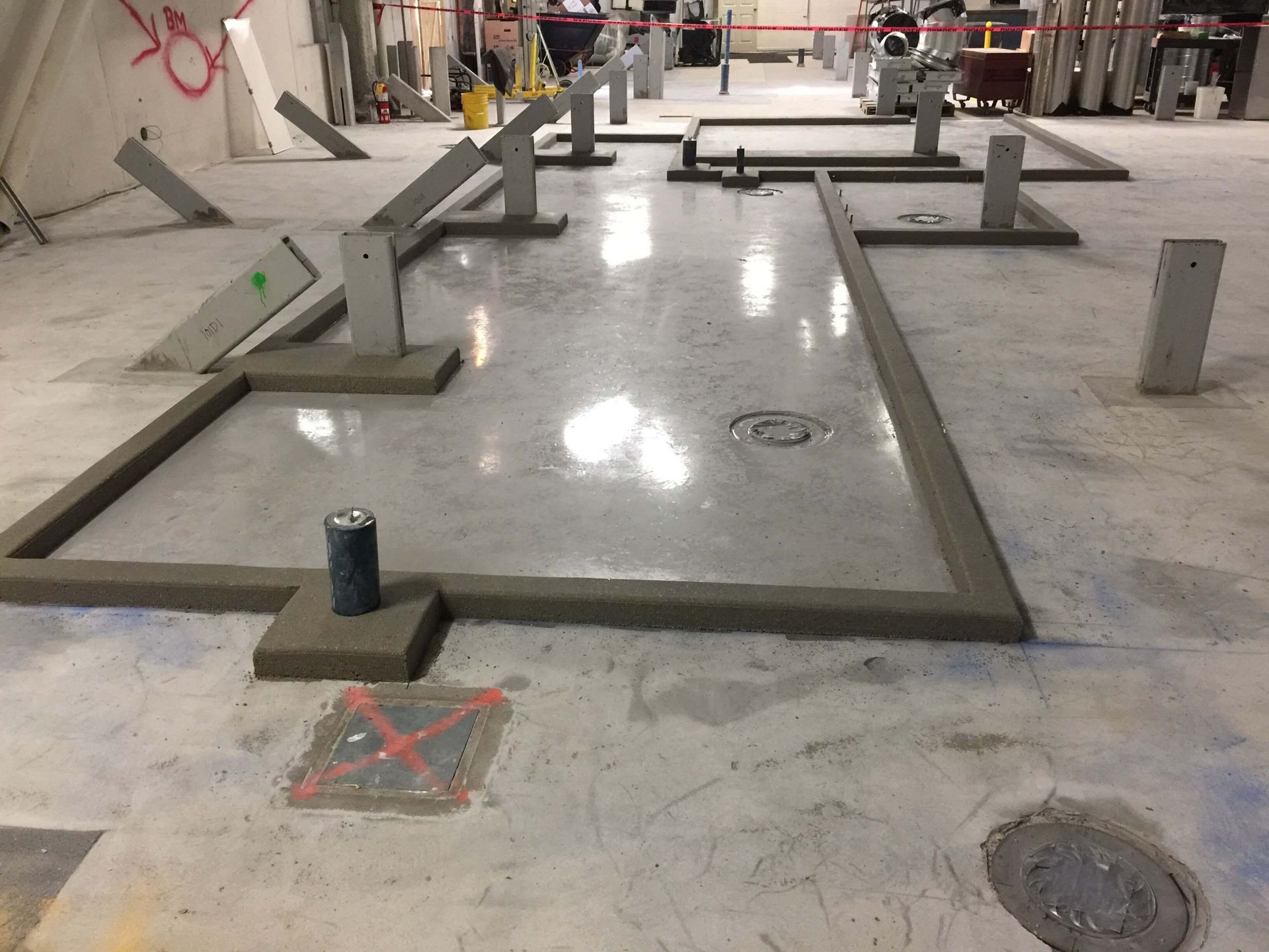 A room with a lot of concrete blocks on the floor