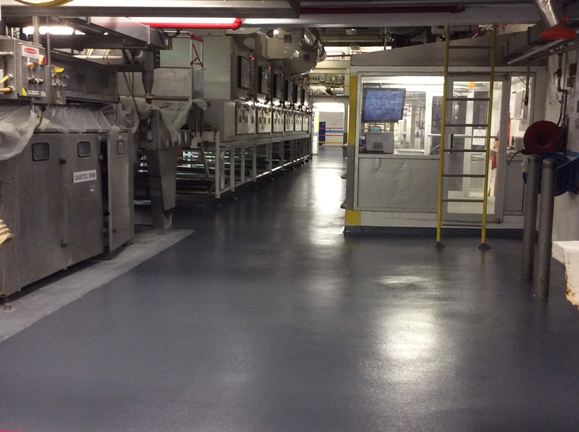 A large room with a lot of machinery in it