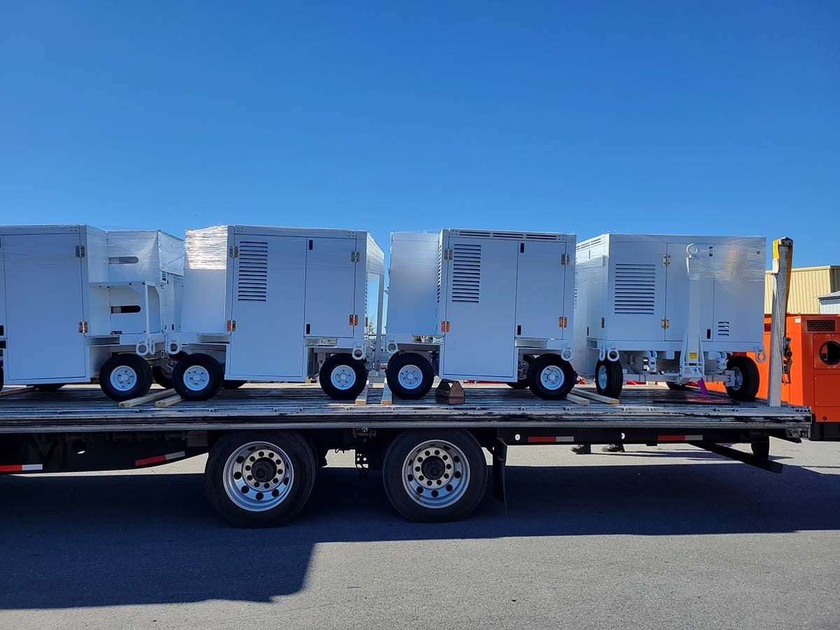 A tow truck with a bunch of boxes on it