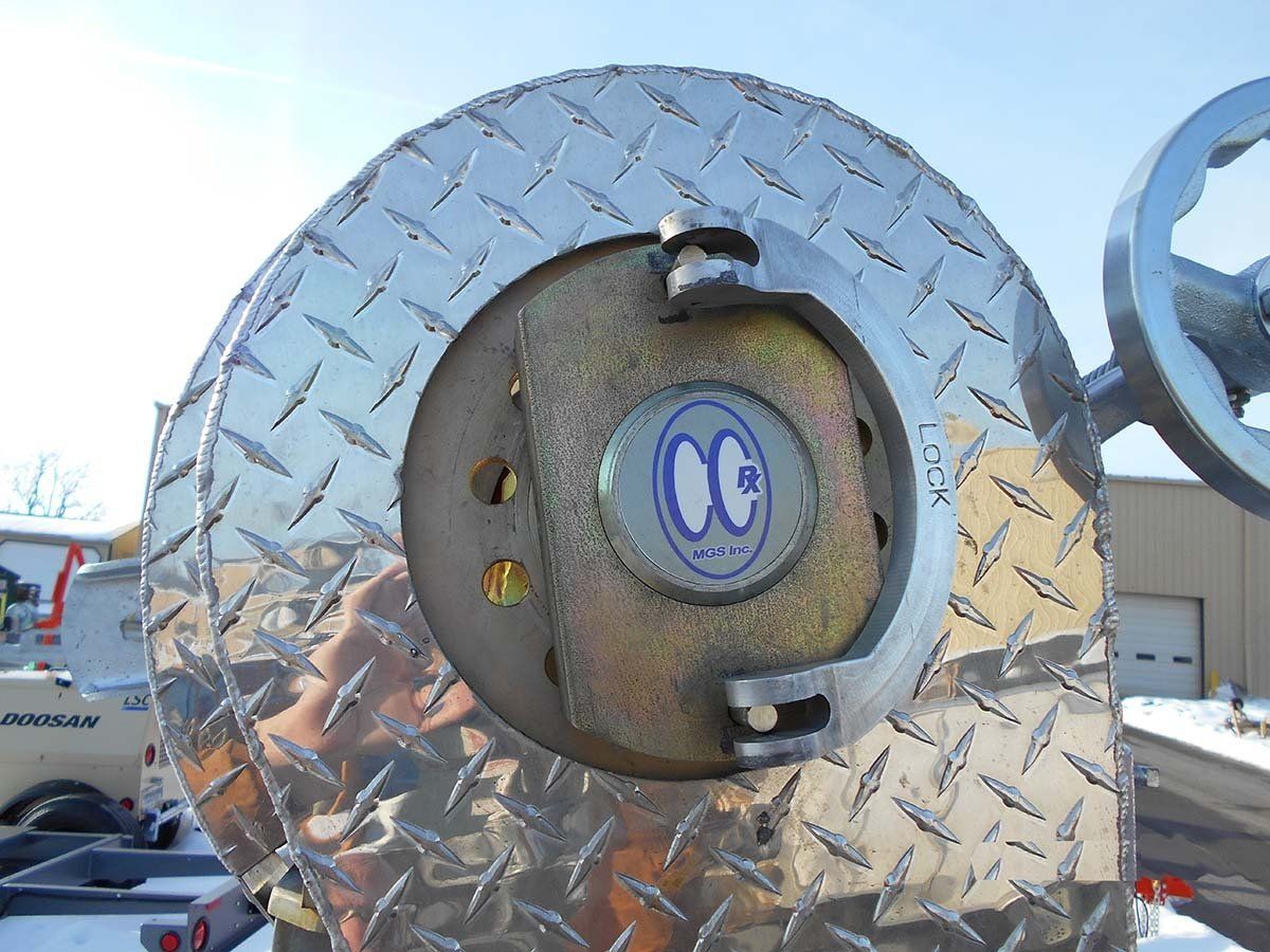A close up of a metal object with a lock on it