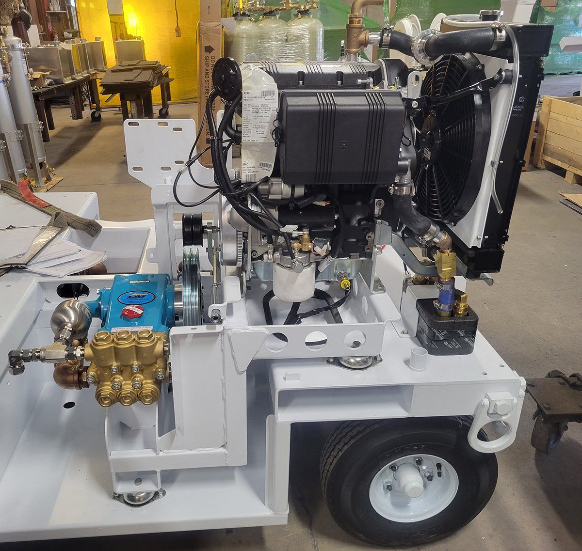 A white machine with a blue pump on it