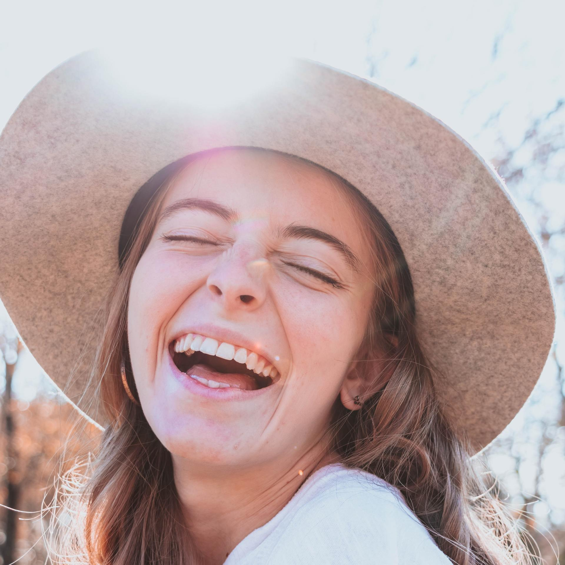 Woman smiling | Top family dentist in Lawrence KS 66049