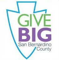 The logo for san bernardino county is a shield with the words `` give big '' written on it.