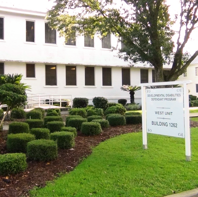 Photo of contract, papers, and a pen.
