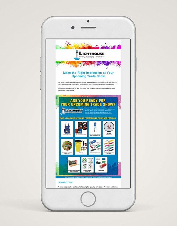 a white cell phone with a colorful advertisement on the screen .