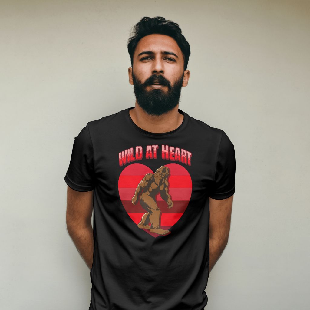 a man with a beard is wearing a t-shirt that says wild at heart