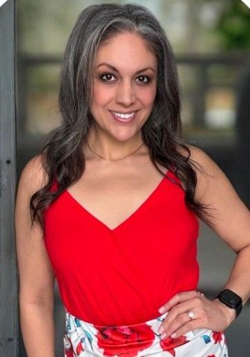 A silhouette of a woman without a face on a white background.