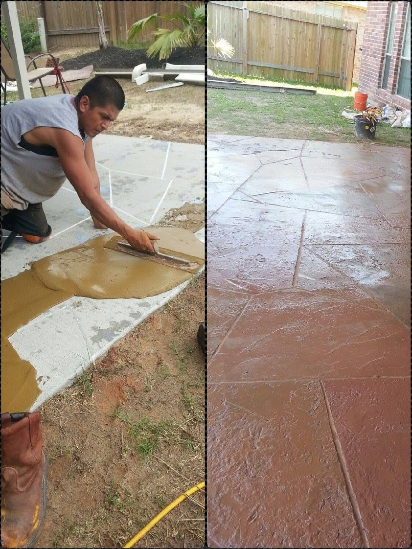 Man applying sealant to a concrete patio, transforming it from gray to red-brown. Outside setting.