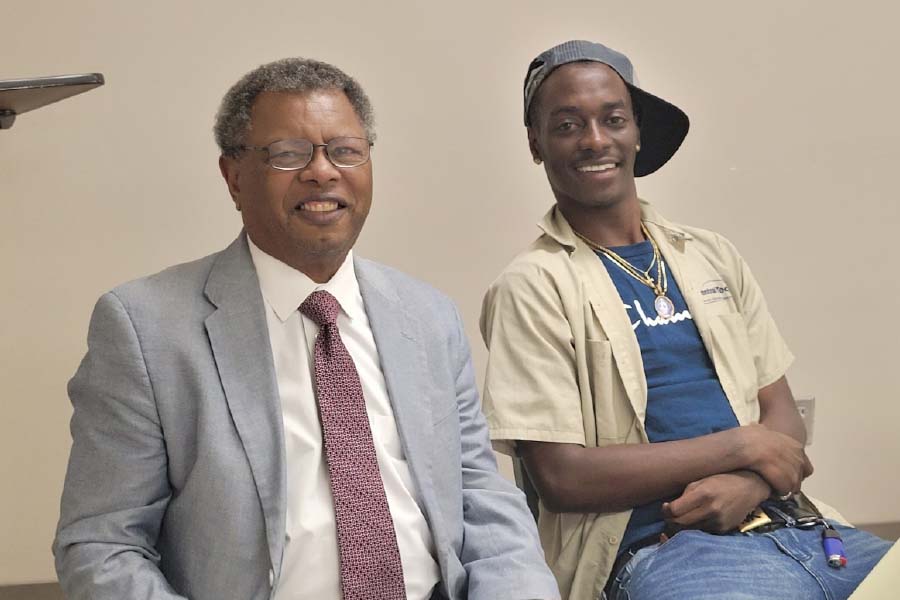 Executive Director David Phillips with 1st Step graduate Byron Daniels, now gainfully employed in the trucking industry.