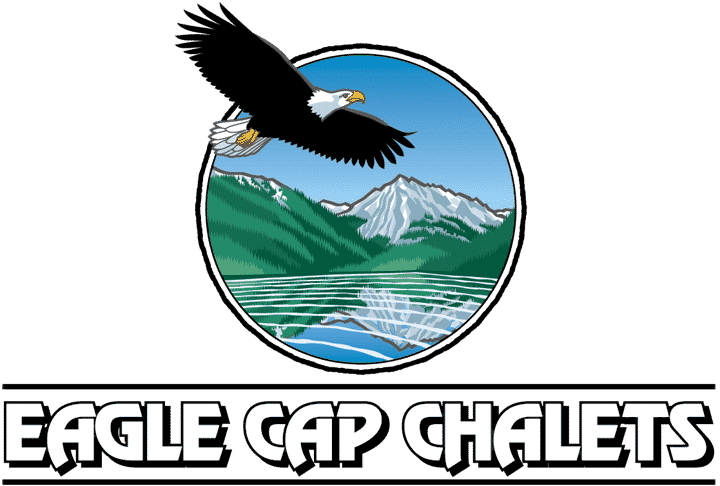 The logo for eagle cap chalets shows an eagle flying over a lake