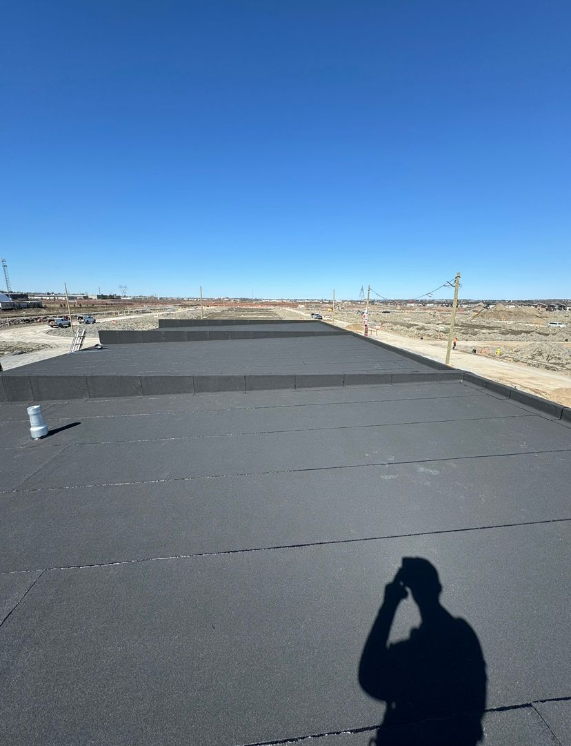 Ottawa flat roofing services professional contractor offering year round roof repairs