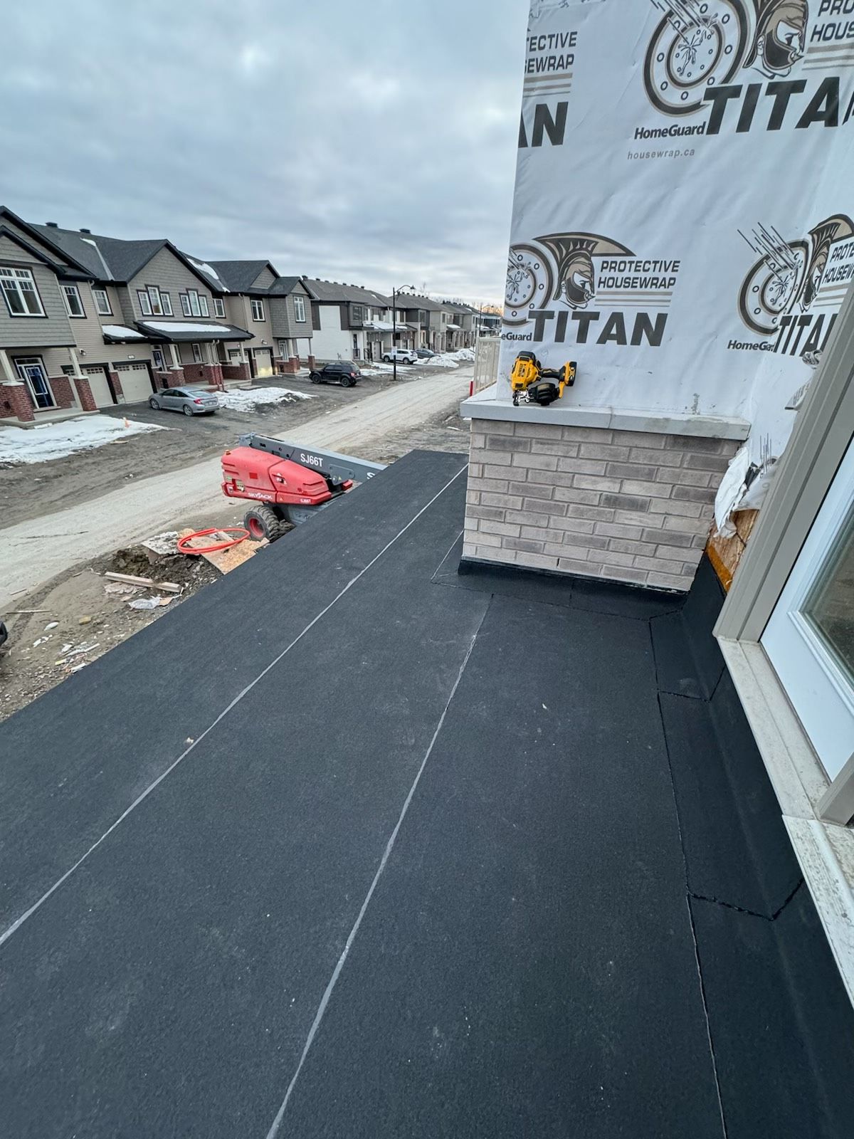 Flat roof post-inspection after snow and ice removal Ottawa