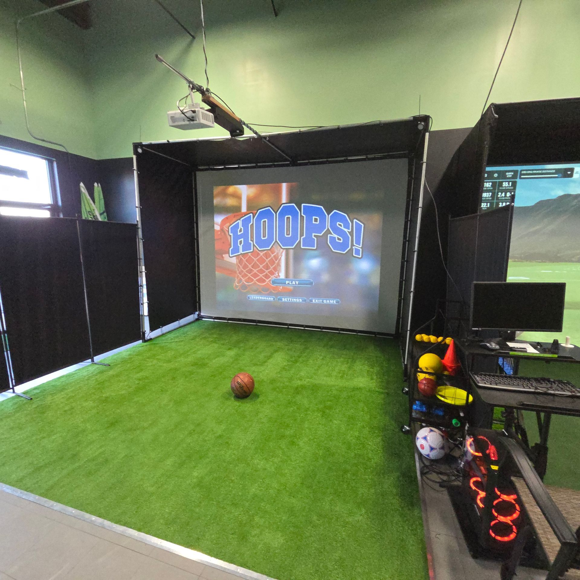 Hand in golf glove placing a white golf ball on green artificial turf next to a golf club.